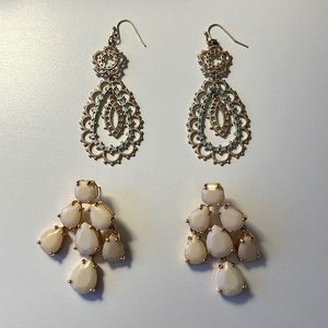 Two pairs of earrings.
